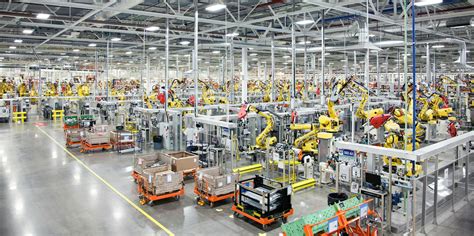 foxconn  bringing   robot workers     million