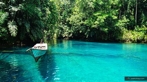 labuan cermin two layers lake in indonesia peek holidays