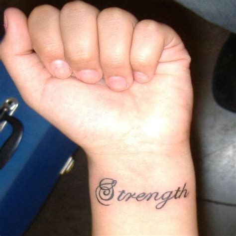 strength tattoo facing hardships with courage body art diary