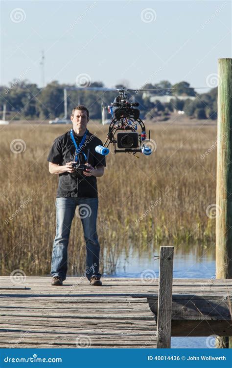 man flying unmanned drone stock photo image  person