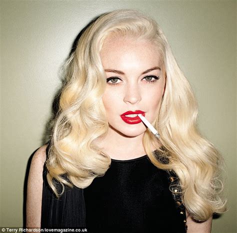 Looking Smoking Like Her Idol Troubled Actress Lindsay Lohan Clutches