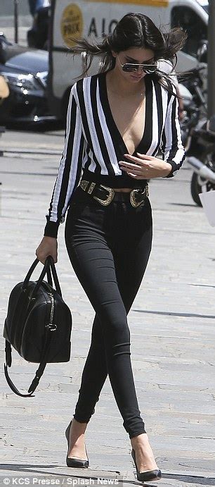 kendall jenner shows cleavage in a plunging top as she steps out in paris daily mail online
