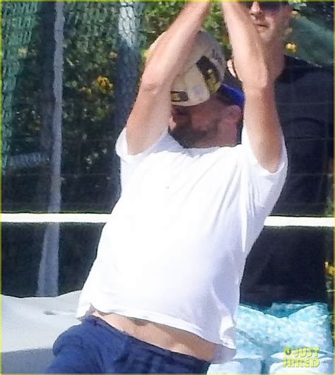 leonardo dicaprio gets hit in the face with a volleyball ouch photo