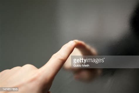 Finger Touching Steamy Mirror Photo Getty Images