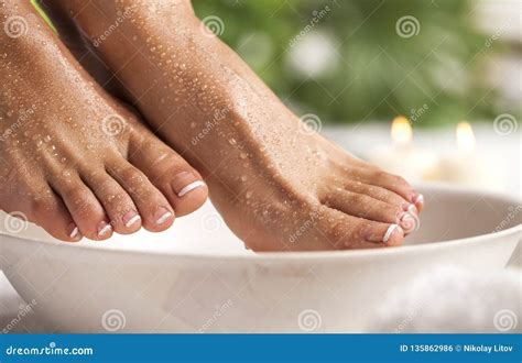 foot spa   tropical green leaves background stock photo image