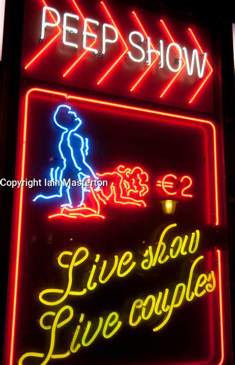 Neon Signs Outside Sex Club In Red Light District Of