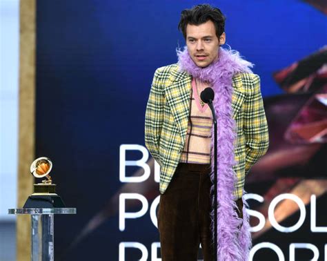 Harry Styles’ Iconic Grammy Outfits Spark Huge Rise In Sales Of Feather