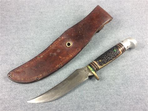 western usa fixed blade hunting knife  sheath worth