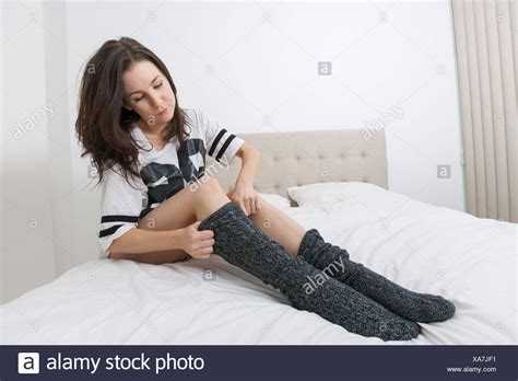 Bed In Mature Sock Wearing Woman