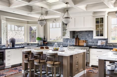 blog 4 kitchens with white cabinets and a wood island