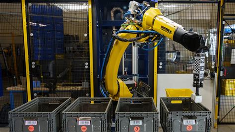amazon s latest robot picker for warehouses uses ai to identify objects