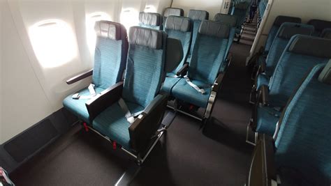 cathay pacifics    er economy seat business traveller