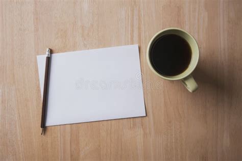 blank paper note  coffee  pencil  wooden table ready stock