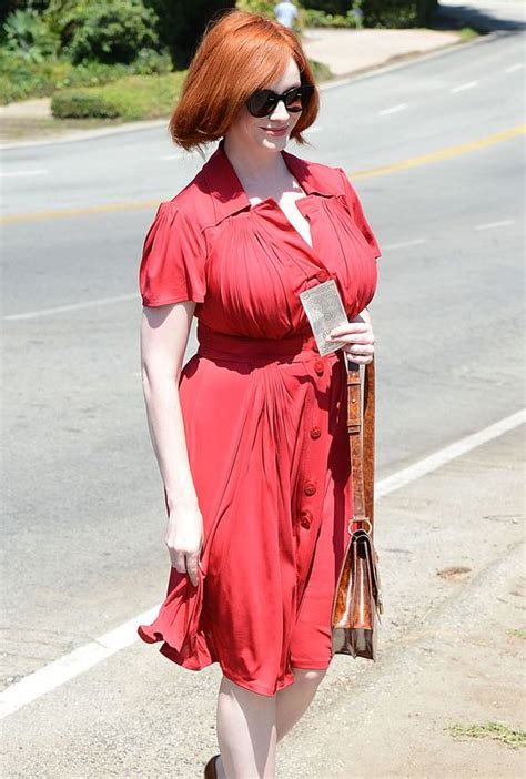 scarlet lady christina hendricks highlights her famous curves in a