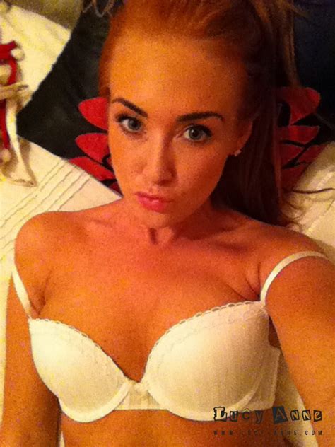 lucy anne in her white lingerie alone in her bedroom web