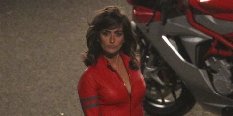 penelope cruz stuns in red leather jumpsuit on the set of