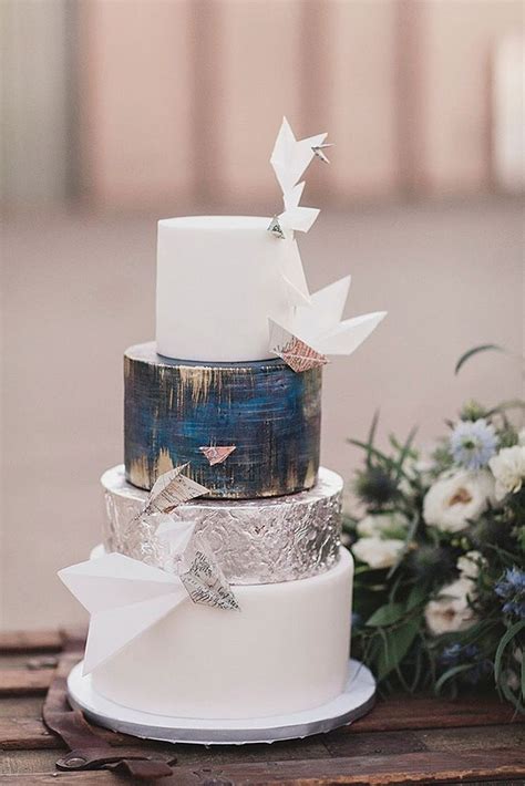 unique wedding cakes layer blue with metallic effect and paper