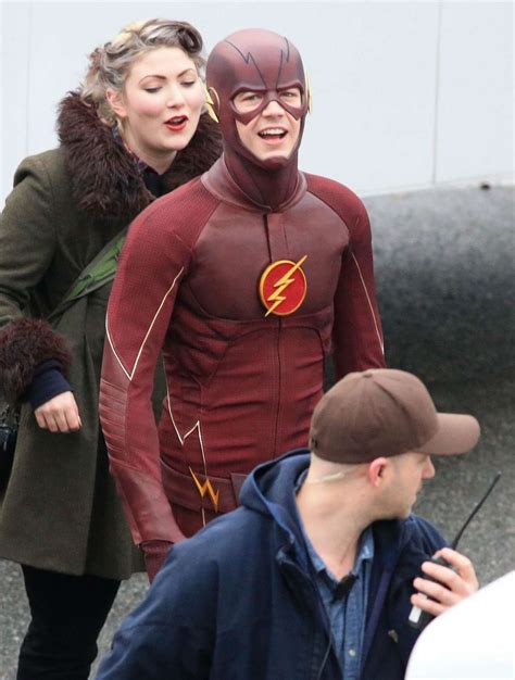 grant gustin and candice patton share a kiss on the flash set 20