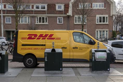 dhl company car standing   amsterdam  netherlands  editorial photography image