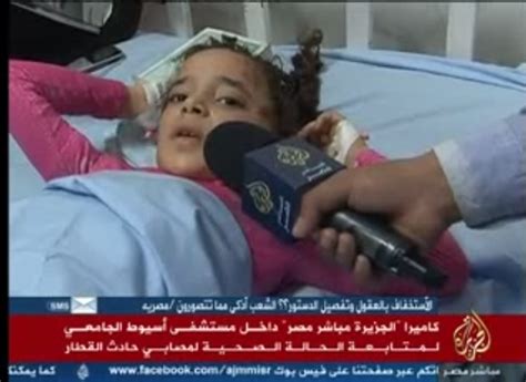 بالفيديو طفلة من مصابى اسيوط للمسئولين عبر قناة الجزيرة انتوا كلاب