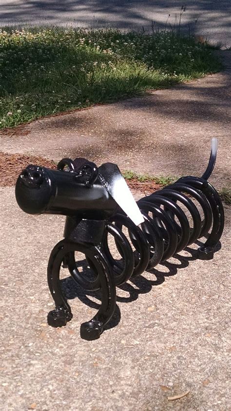 welded scrap metal spring dog tippy  paula miller arte de patio