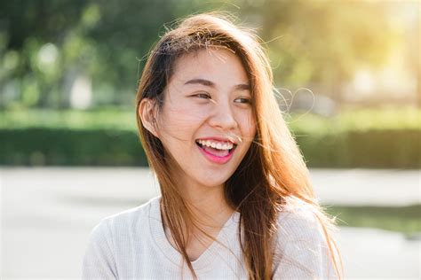 Lifestyle Happy Young Adult Asian Woman Smiling With Teeth Smile – Rose
