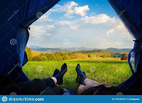 two people lying in tent view from inside couple camping