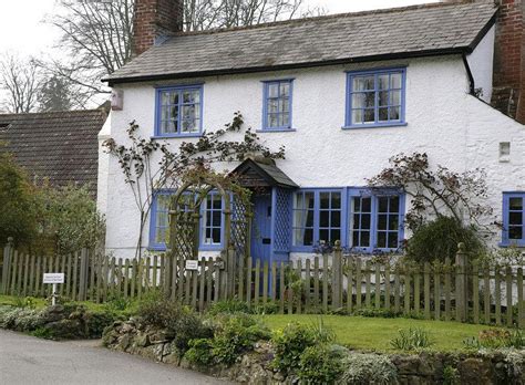 blue cottage surrey places  visit village cottage cabin visiting house styles blue