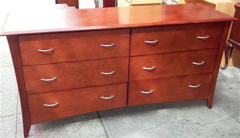 uhuru furniture collectibles sold  modern cherry finish  drawer