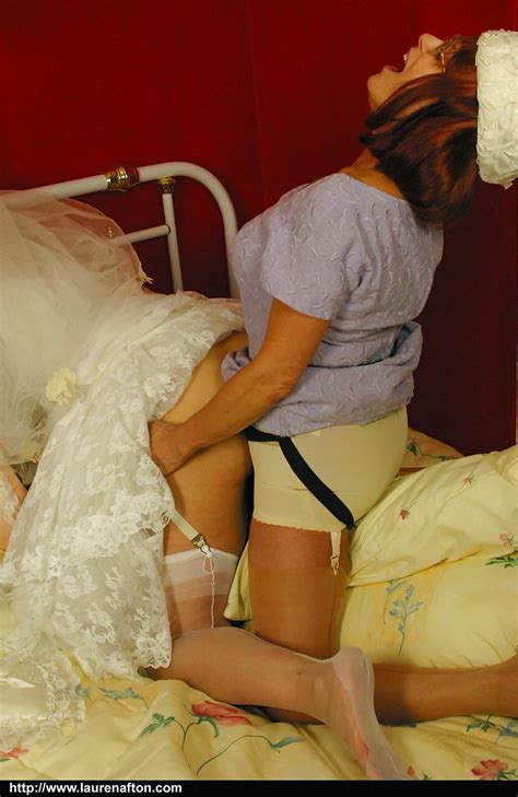 hot bride miss abigail in stockings and high heels enjoys lesbian strapon fuck