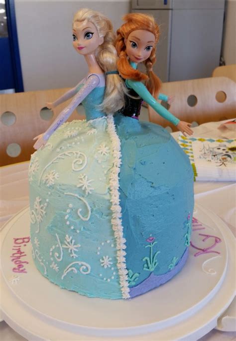 double barbie elsa and anna frozen cake a step by step post on how to make this cake frozen