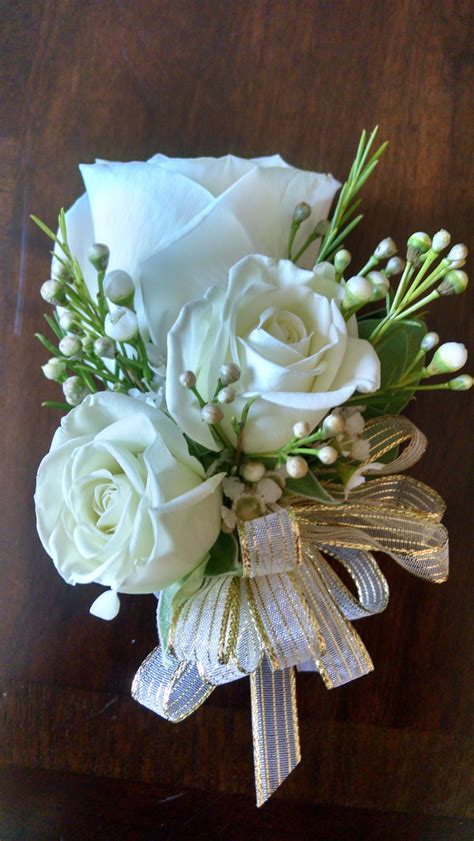 loved  pinned   blooming envy design mothers corsage white roses white wax flower