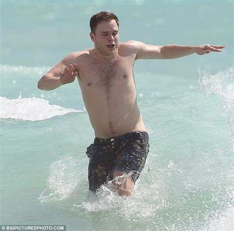 Olly Murs Sports A Rounder Stomach While Enjoying A Beach Holiday In