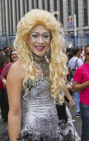 Vintage Crossdresser With A Big Wig At The Pride Parade