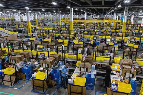 amazon closes abandons plans  dozens  warehouses    bloomberg
