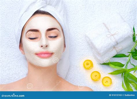 spa woman applying facial mask stock image image  acne healthy