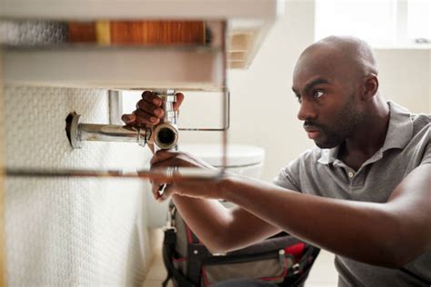 african american plumber stock  pictures royalty  images istock