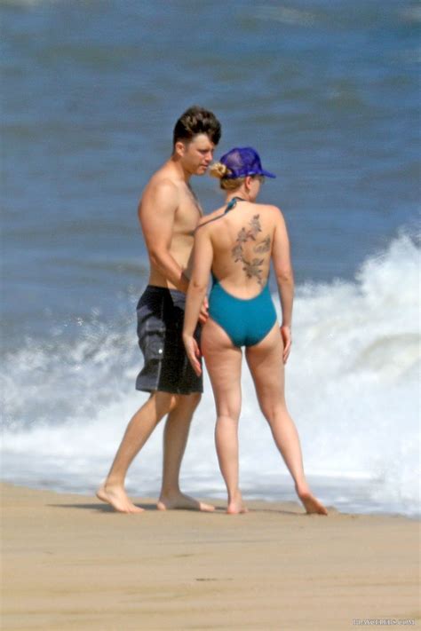 Scarlett Johansson Caught Wearing Sexy Bath Suit On A