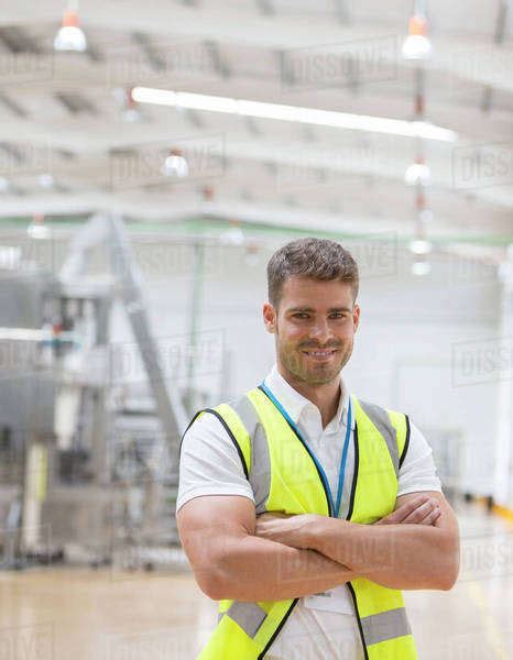 worker smiling  factory stock photo dissolve