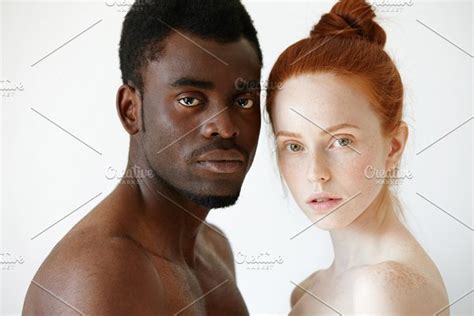 Portrait Of Happy Loving Interracial Couple Shirtless