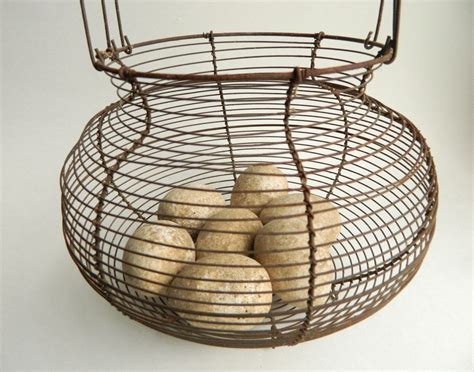 antique wire egg basket   chalkware eggs