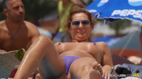 Topless Milf Gets Some Sun In The Sand Voyeur Porn