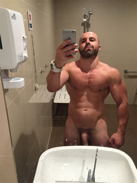 muscular daddy shows his 9 inch cock in the locker room