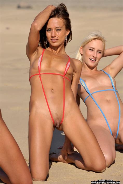 four girls in sling bikini on the beach redbust