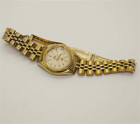 Luxury Timex Indiglo Gold Day Date Watch For Women 1990s Vintage