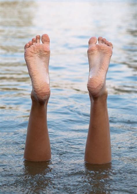 Female Legs And Feet Upside Down In The Water Stock Image Image Of