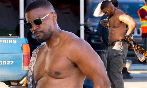 jamie foxx shows off his muscular physique after push ups on the set of
