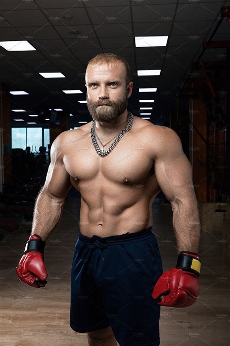 strong muscular man boxing   gym high quality sports stock