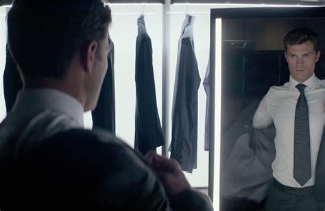 christian grey strips off in the latest trailer for 50 shades of grey