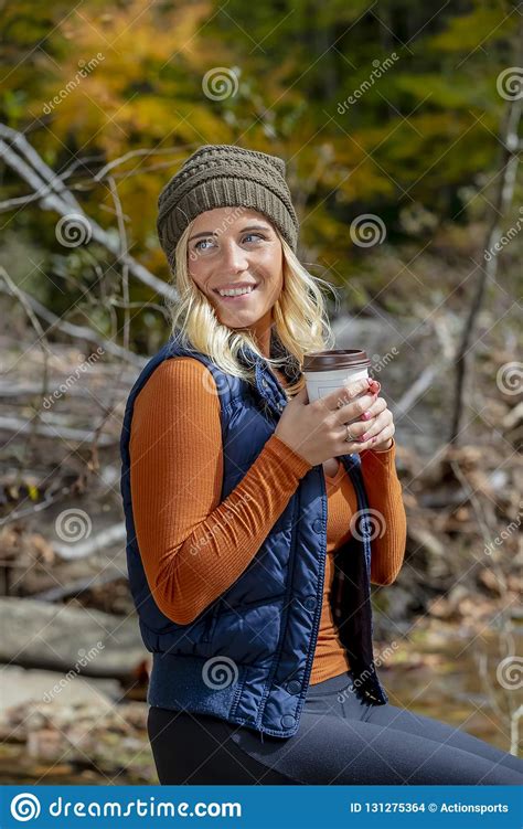 Lovely Blonde Model Enjoying The Outdoors During Fall